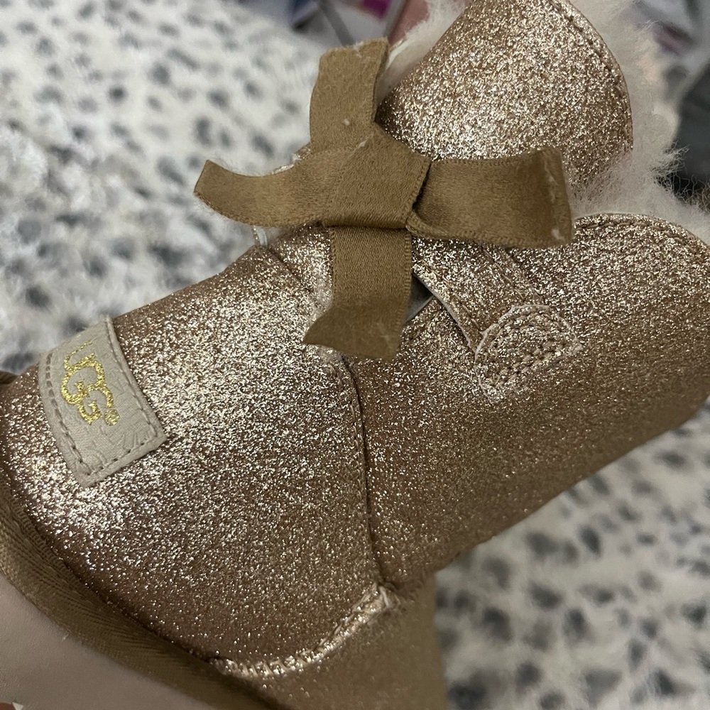UGG Sparkling Gold Boots with Bows